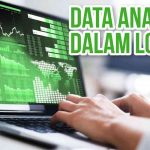 Laptop menampilkan grafik data analytics dengan teks tentang analitik data dalam logistik.
