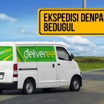 Mobil ekspedisi Deliveree melaju di jalan pedesaan menuju Denpasar-Bedugul.