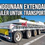 Extendable trailer mengangkut muatan panjang di jalan tol dengan lalu lintas padat di sekitarnya.