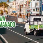 Layanan jasa sewa pickup Deliveree di jalan utama kota Manado.